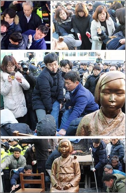 ▲부산동구청 직원들이 주부산일본총영사관 앞에 설치된 소녀상을 지키는 시민과 학생을 강제로 끌어내는 모습 ⓒ미래세대가세우는평화의소녀상추진위페이스북